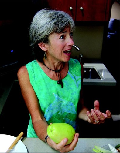 Ann holds forth on the virtues of the refreshing and versatile christophene (chayote) used in several recipes. ©  SW